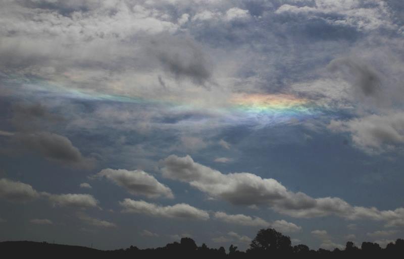 Iridescent clouds seen by EarthSky Facebook friend Mike O'Neal in Oklahoma on May 27, 2013.  Thank you, Mike.