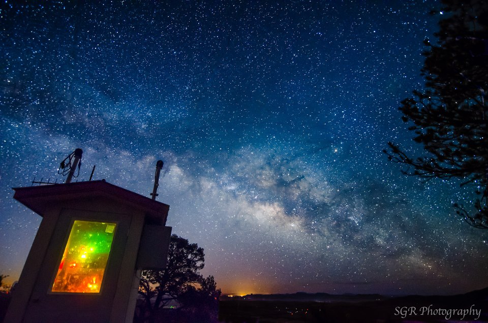 'A nice West Texas sky from Mt. Locke, in the Davis Mountains near the McDonald Observatory ... Even from this remote location, you can see the light coming from Fort Davis on the bottom of the image. by EarthSky Facebook friend Sergio Garcia Rill