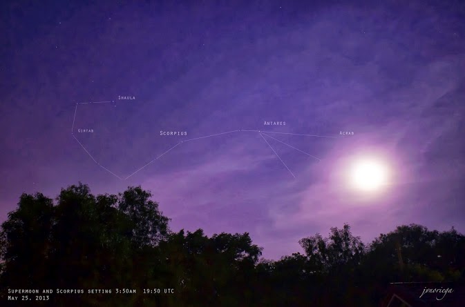 View larger. | Jv Noriega in Manila, Philippines also caught the supermoon as it was setting on the morning of May 25, 2013.  The constellation Scorpius was near the moon.  Scorpius' bright star Antares could be seen in the moon's glare.