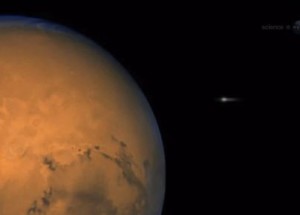 Artist's concept Comet ISON flies by Mars.  Via NASA