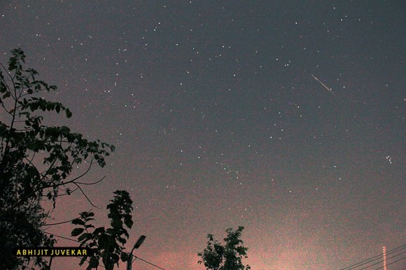 A North Taurid meteor seen fleeing its radiant point near the Pleiades in the constellation Taurus. Captured by EarthSky Facebook friend Abhijit Juvekar on November 12, 2013. Thank you, Abhijit!