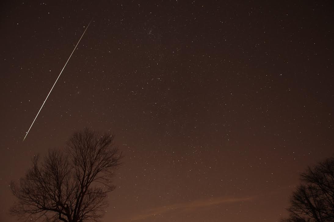 View larger. | Geminid meteor 2012 as captured by Henry Shaw of SummersMagic Photography.  Click here to learn from Henry how to take photos of meteors.