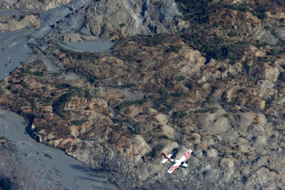 The Oso, Washington mudslide as viewed from the air on March 24, 2014. Photo by Ted S. Warren via the Concord Monitor.