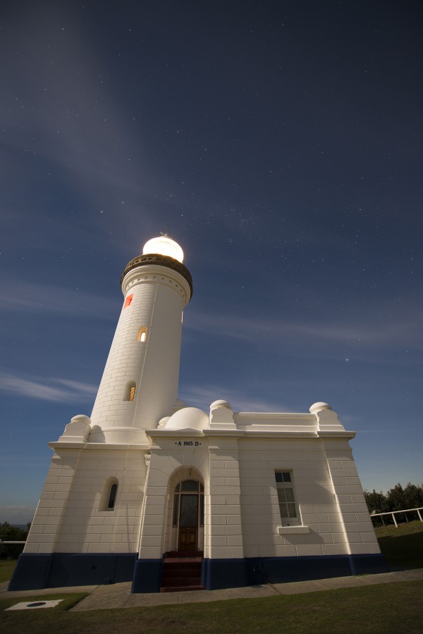 From southerly latitudes on Earth's globe, the Southern Cross is higher in the sky.  This image features the Southern Cross, including the Pointers, prominently over the tower of the Norah Head Lighthouse.  Multiple other stars and objects, including Omega Centauri globular cluster are visible.  Photo taken June 2, 2015 by Darren Rickett at Norah Head lighthouse in Australia.