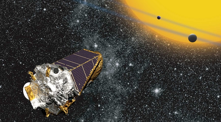 Artist's concept of Kepler space telescope observing exoplanets, via NASA.