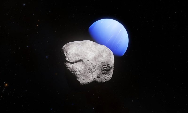 Neptune and its smallest known moon Hippocamp.