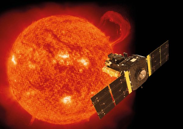 Orange sun with bright spots on it and a flare, and a spacecraft with solar panel 'wings'.