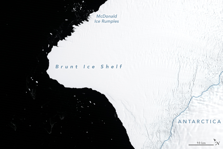 Large white area (ice) against black ocean.