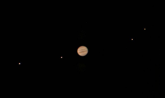Jupiter and its four major moons as seen through a 10
