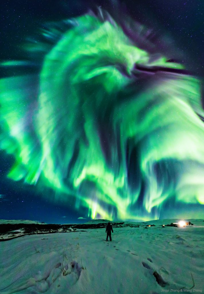 Green dragon-like aurora over Iceland.