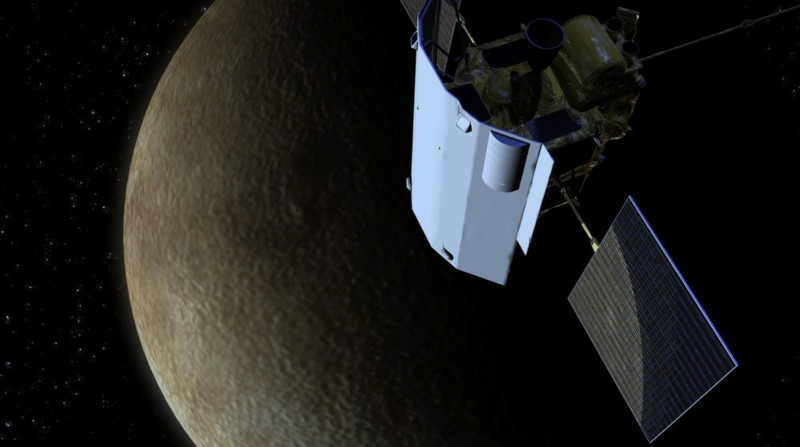 Cylindrical spacecraft with solar power panels orbiting medium dark rough surfaced planet.