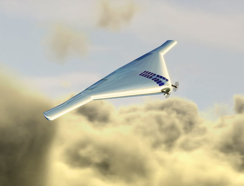 Flying wing aircraft with two small propellers and solar panels on top above clouds.