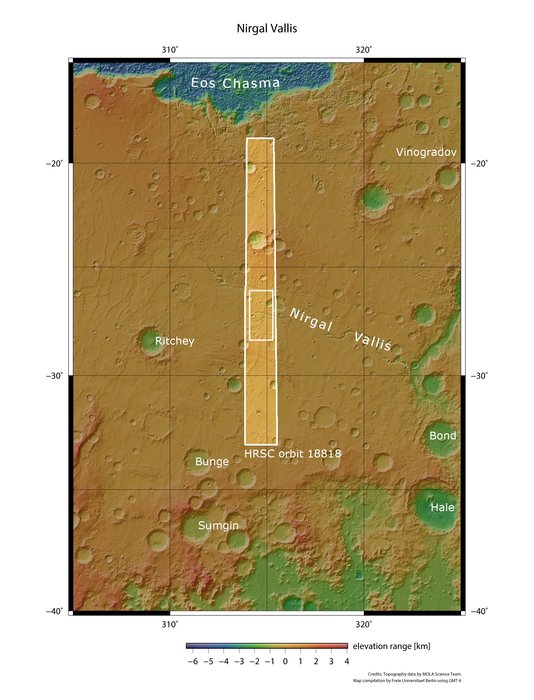 Satellite view of wide section of Mars with lower elevations in green and outlined rectangular area.