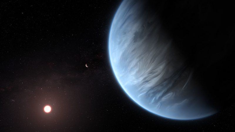 Bluish planet with clouds near star.